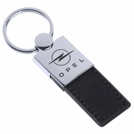 Schlüsselanhänger aus Poliertem Metall und Leder Schlüsselanhänger aus Poliertem Metall und Leder - Imprint Now - DE