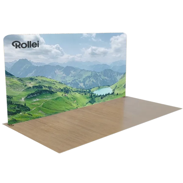 A trade show display features a large, tabletop-size rectangular banner with an image of a chameleon on a desert background.