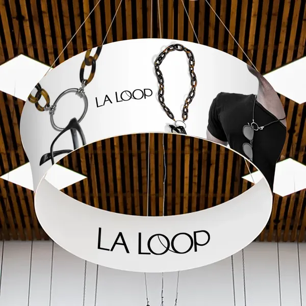 Bannière suspendue circulaire fuselée pour salon professionnel - Imprint Now - FR